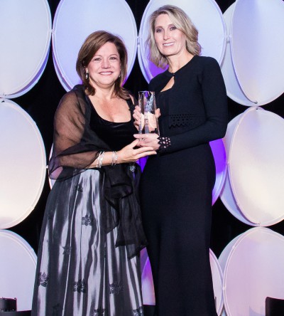 Kathy Lehne receiving the lifetime achievement award.